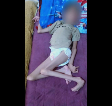 POUSSETTE POUR UN ENFANT HANDICAPÉ DE 13ANS