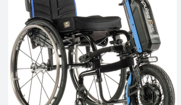 Un fauteuil roulant pour Naged