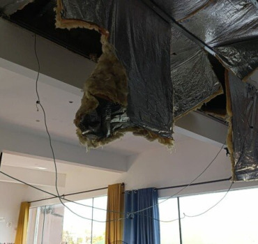 Reconstructions d une maison apres un Cyclone